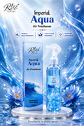 Rizz Parfums Imperial Aqua 270ml premium Arabic air freshener bottle and display box set on a marble base flanked by crystalline blue water patterns and lotus flowers.