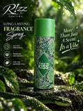 Rizz Parfums Venom Kiss 200ml luxury green snakeskin perfumed deodorant body spray canister standing on wet mossy rocks inside a lush rainforest.
