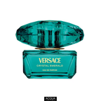 A close-up shot of the elegant 90ml jewel-toned emerald green glass bottle of Versace Crystal Emerald Pour Femme highlighting its signature oversized crystal cap and gold logo detailing.